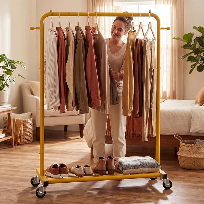 Sywhitta Clothing Rack on wheels, Clothes Rack with Bottom Mesh Storage Shelf,Sturdy Metal Frame,for Hanging Clothes,Coats,Skirts,39.76 "W x 16.06" D x 63.78" H,Gold Yellow
